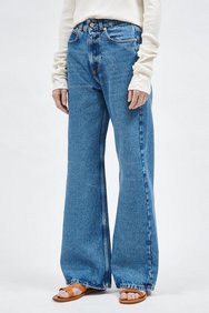 Джинсы клеш