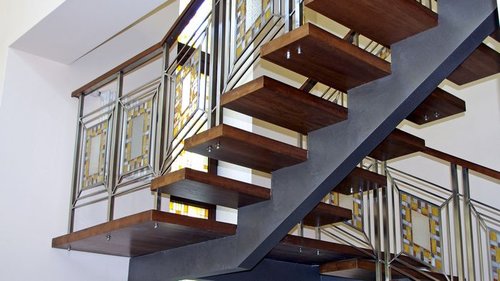 Особенности выбора дизайнерских лестниц