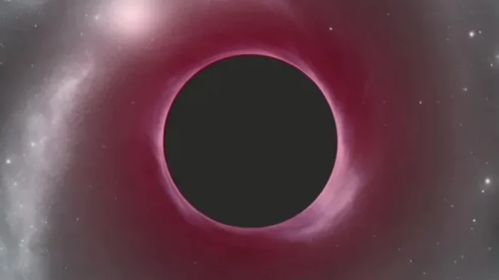Найдена «красная» черная дыра: она не подходит ни своей галактике, ни возрасту Вселенной